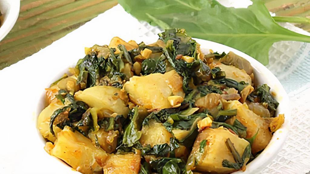 Aloo Palak · Spinach and potatoes cooked with onion.