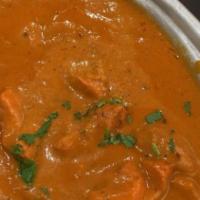Chicken Tikka Masala · Marinated chicken breast, skewered cooked in our tandoor then sautéed in a rich, homemade cr...