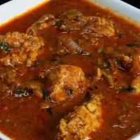 Chicken Curry · Chicken cooked with onion, tomato, and aromatic spices.