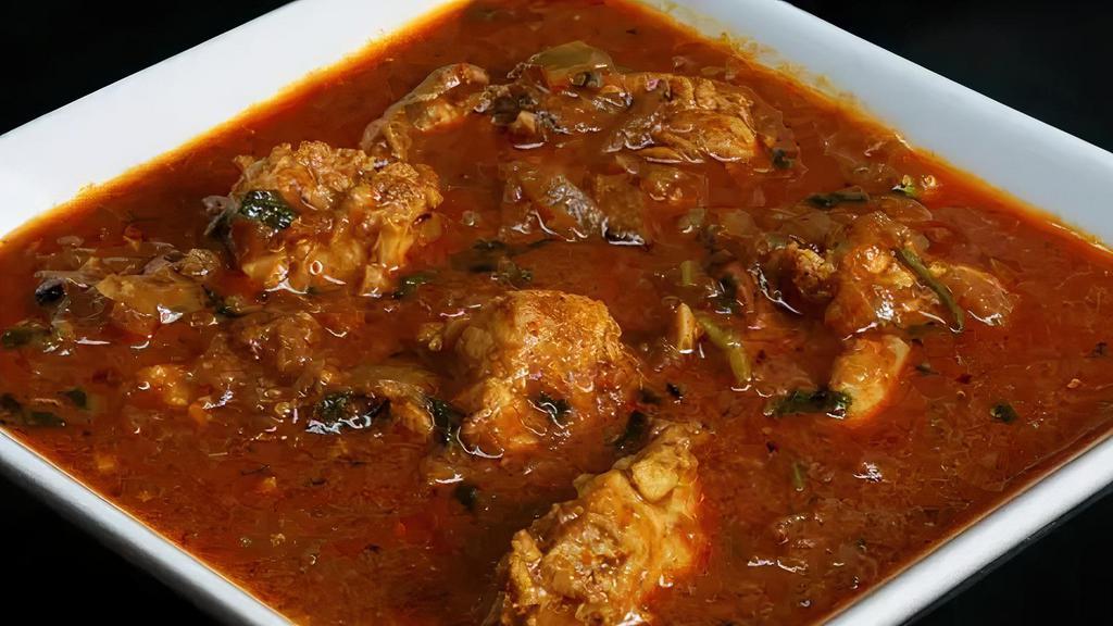 Chicken Curry · Chicken cooked with onion, tomato, and aromatic spices.