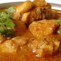 Chicken Vindaloo · Delicious tangy delight. Boneless chicken thigh cooked with exotic spices, tangy vinegar tom...