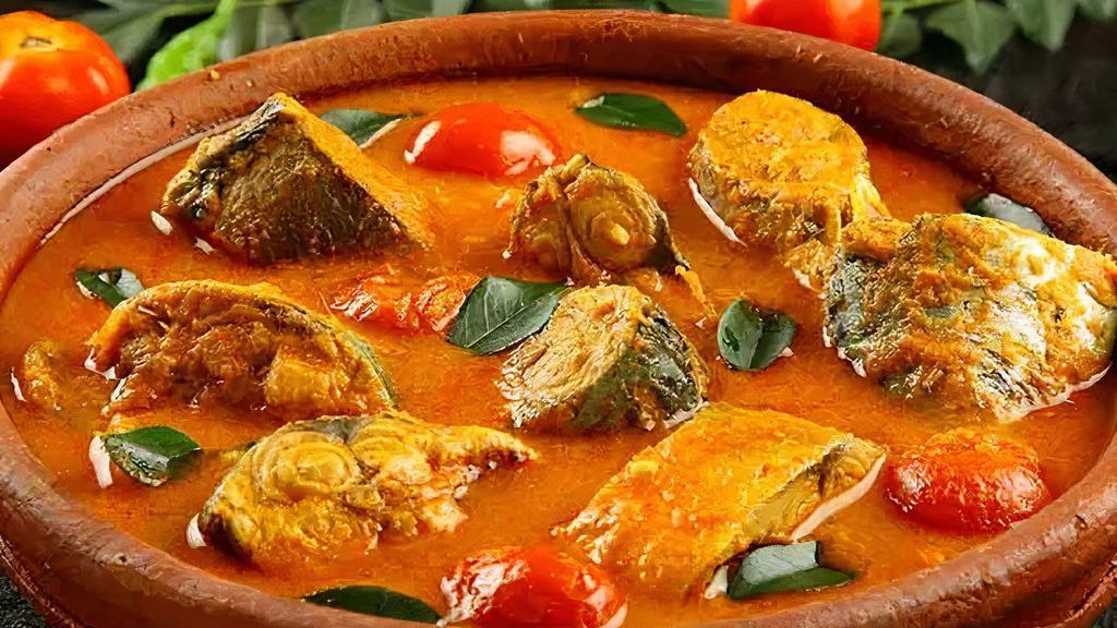 Fish Curry · Fish cooked in light gravy with fresh ground spices.