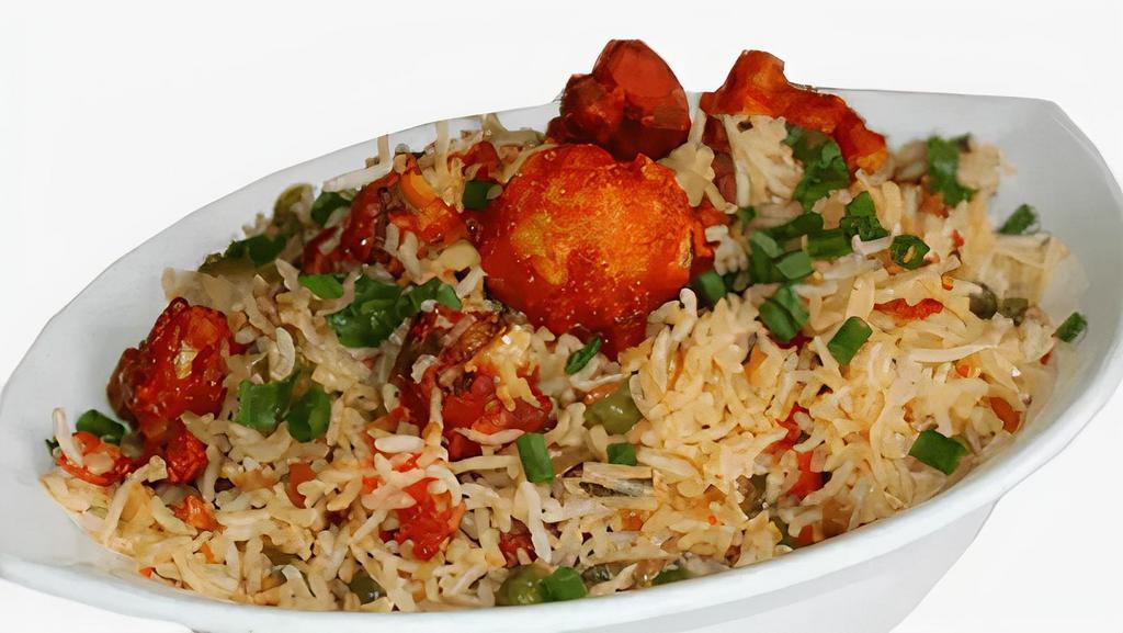 Vegetable Manchurian Fried Rice · vegetable balls tossed with Manchurian sauce and rice