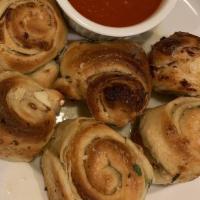 Garlic Knots · Served with marinara sauce.