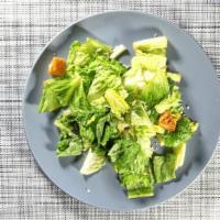 Caesar Salad · Romaine lettuce, parmesan cheese, creamy Caesar dressing, garlic croutons.