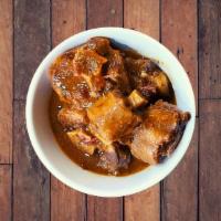 Oxtail Stew - Rabo Guisado · Slow-cooked, delicious oxtail stew. - customer favorite