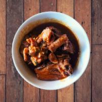 Mofongo Con Pollo Guisado · Mofongo with stew chicken.