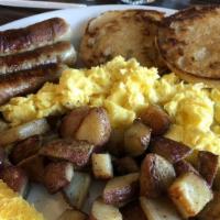 Double Keesta · 2 eggs with a choice of bacon, ham, sausage, or chourico. Comes with toast and spuds ( home ...