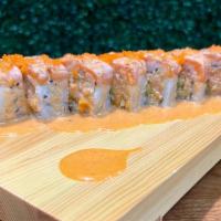 Sunrise Roll · In: lobster salad, crunchy, avocado /top: seared salmon, fish eggs with spicy mayo.
