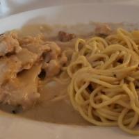 Petto Di Pollo Angelica · Fresh chicken breast filets sautéed in a white wine cream sauce with fresh mushrooms.