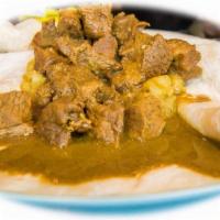 Curry Goat Roti · 
