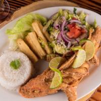 Pescado Entero Pargo (Red Snapper) · Fried whole red snapper fish, served with homemade salad and white rice.