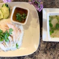 Chicken Over Rice[Khao Man Gai] · Chicken with best quality jasmine rice simmer in chicken stock and thai herbs