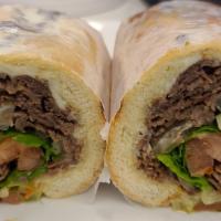 Steak & Cheese · 5oz Philly-style steak, lettuce, tomato, grilled onion and mushroom, provolone, mayo on a su...