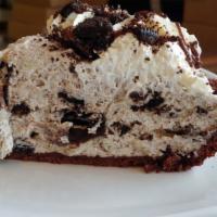 Cookies & Cream Slice · White Chocolate graham cracker crust, ribbons of chocolate, crushed Oreos, homemade chocolat...