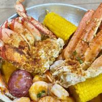 Seafood Bowl # 4 Snow Crab Leg, Dungeness Crab, Head Off Shrimp · Served with Corn on the Cob and Potato.
Choice of Seasoning: Cajun, Old Bay, Garlic Butter S...