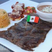Steak Tampiqueño · Eleven ounce grilled tender skirt steak. Served with rice, beans, one cheese enchilada, and ...
