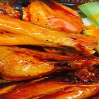 Diablo Wings · An order of hot buffalo wings roasted and smothered with sauce.