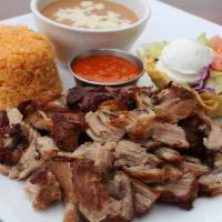 Carnitas · Ten ounce seasoned pork sliced into chunks and slow-cooked, which originated from the state ...