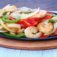Shrimp Fajitas · Served with onions, bell peppers, beans, and rice: garnished with lettuce, pico de gallo, so...