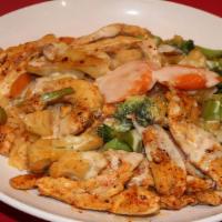 Pollo Con Vegetales · Pollo con vegetales grilled chicken with broccoli, cauliflower, and carrots. Served on a bed...
