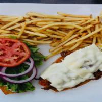 Steak Sandwich · Grilled steak strips topped with swiss cheese on a soft bun.