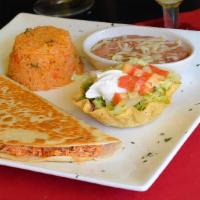 Simply Quesadilla · We stuffed our cheese quesadilla with your choice of ground beef or chicken. Served with ric...