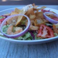 Shrimp Salad · Grilled shrimp on a bed of lettuce, tomatoes, onions, avocado, tortilla straws, and queso fr...