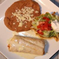 Lunch Chimichanga · Soft or Fried tortilla filled with chicken or beef. Served with lettuce, tomatoes, sour crea...