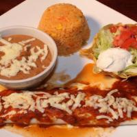 Lunch Burrito Deluxe · Beef or Chicken. Served with rice and bean, lettuce, tomatoes, and sour cream.
