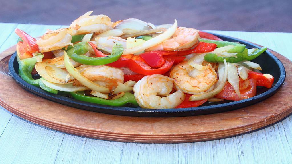 Lunch Shrimp Fajita · Grilled shrimp with tomatoes, bell peppers, and onions. Served with rice, beans, and tortillas.
