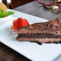 Chocolate Lovers Dream · Alternating layers of chocolate cake and chocolate mousse and topped with dark chocolate gan...