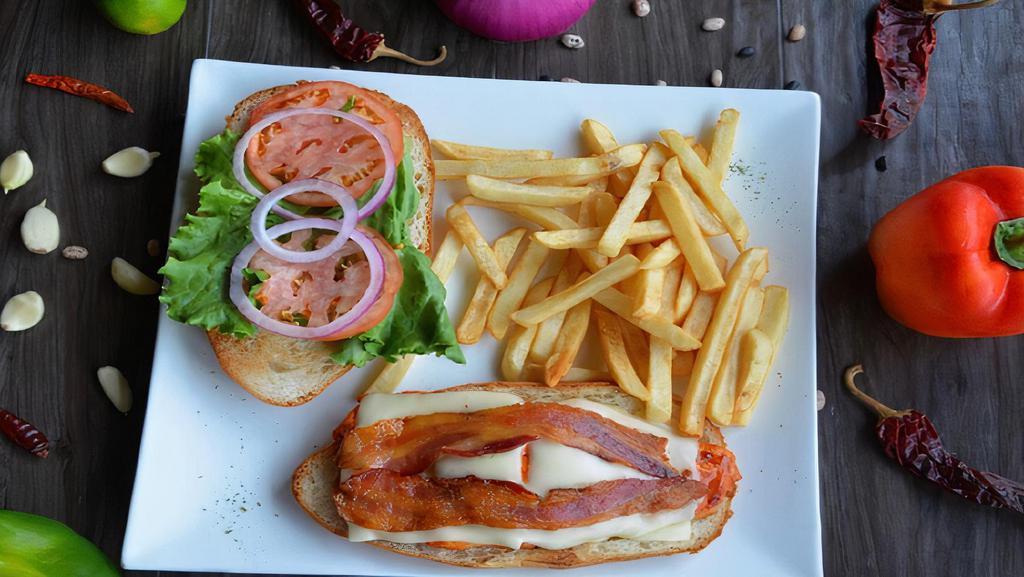 New Chicken Club · Grilled boneless chicken breast topped with crispy bacon, swiss cheese, lettuce, and tomato.