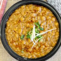 Chana Masala · Vegetarian. Chickpeas sauteed with fresh ginger and garlic and cooked Northern Indian style.