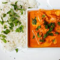 Chicken Tikka Masala · Chicken pieces roasted in a clay oven tossed in a creamy tomato sauce.