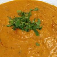 Curry · Thick curry sauce with herbs and spices.