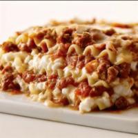 Beef Lasagna · Layers of pasta with homemade marinara sauce, ground beef mozzarella / ricotta cheeses