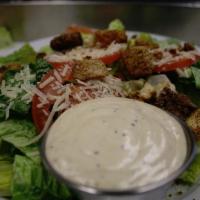 Caesar Salad · Romaine lettuce, tomatoes, croutons & Parmesan cheese