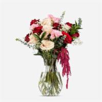 La Vie En Rose · Life is rosy! Arrangement includes a dozen and a half roses, hanging amaranthus, gypsy, euca...