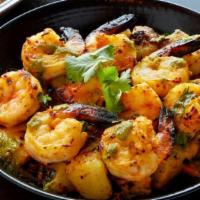 Tandoori Shrimp · Shrimp, cream cheese and sour cream marinade with lemon, garlic, chili and turmeric.