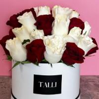 Allure  · A classic combination of perfect red roses and pristine white roses combine for a sophistica...
