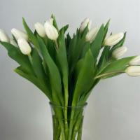 Pearl · White tulips are the flower of choice for an easy, elegant spring day. In a pretty vase with...