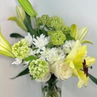 Lime · Ultra-clean with great clarity, a bouquet of white flowers in a vase with some green underto...