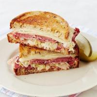 Reuben · Corned beef with sauerkraut, swiss cheese, and thousand island dressing on marble rye.