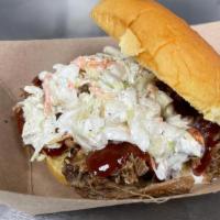 Pulled Pork Sandwich · The Classic, Our Pulled Pork covered in our Sweet & Tangy BBQ Sauce with your Choice of with...
