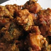 Chicken Pakora(10) · Gluten-free, vegan. Indian crispy light fritters made of chicken in a spiced chickpea flour.