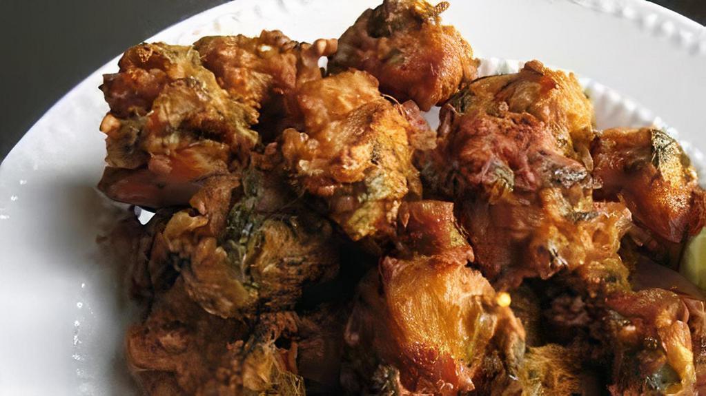 Chicken Pakora(10) · Gluten-free, vegan. Indian crispy light fritters made of chicken in a spiced chickpea flour.