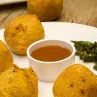 Aloo Bonda (4) · Aloo bonda or potato bonda is a deep-fried tasty snack made with gram flour (besan or chickp...
