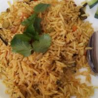 Veg Biryani · Rich and exotic dish cooked with mixed vegetables, spices, and saffron flavored basmati rice...