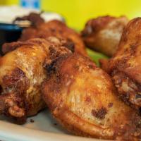 Old Bay Wings · Jumbo wings seasoned Bay style, tossed in your choice of housemade wing sauce. Served with b...